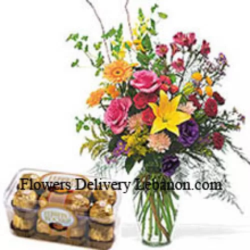 Bunte Blumen in einer Vase mit 16 Stück Ferrero Rocher