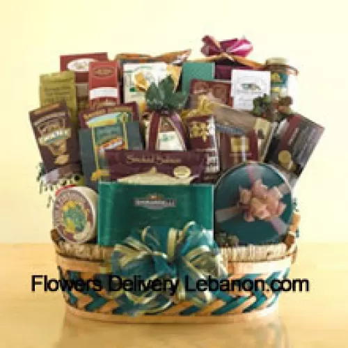 This enormous gift basket is an over-the-top Mother's Day gift that is sure to leave a grand impression! When you need to send something that is truly memorable and is large enough to be enjoyed by a crowd, this gift basket is perfect. This sweet and savory selection features smoked salmon, crackers, cheese, assorted nuts, biscotti, Bavarian-style pretzels, cheese sticks, tortilla chips, salsa, cheese swirls, snack mix, a collection of cookies, caramel popcorn, Ghirardelli chocolate squares, a box of assorted Ghirardelli chocolates, a tin of chocolate-covered sandwich cookies, chocolate-dipped pretzels, chocolate nuggets, and hot cocoa mix. They won't know what to eat first! (Please Note That We Reserve The Right To Substitute Any Product With A Suitable Product Of Equal Value In Case Of Non-Availability Of A Certain Product)